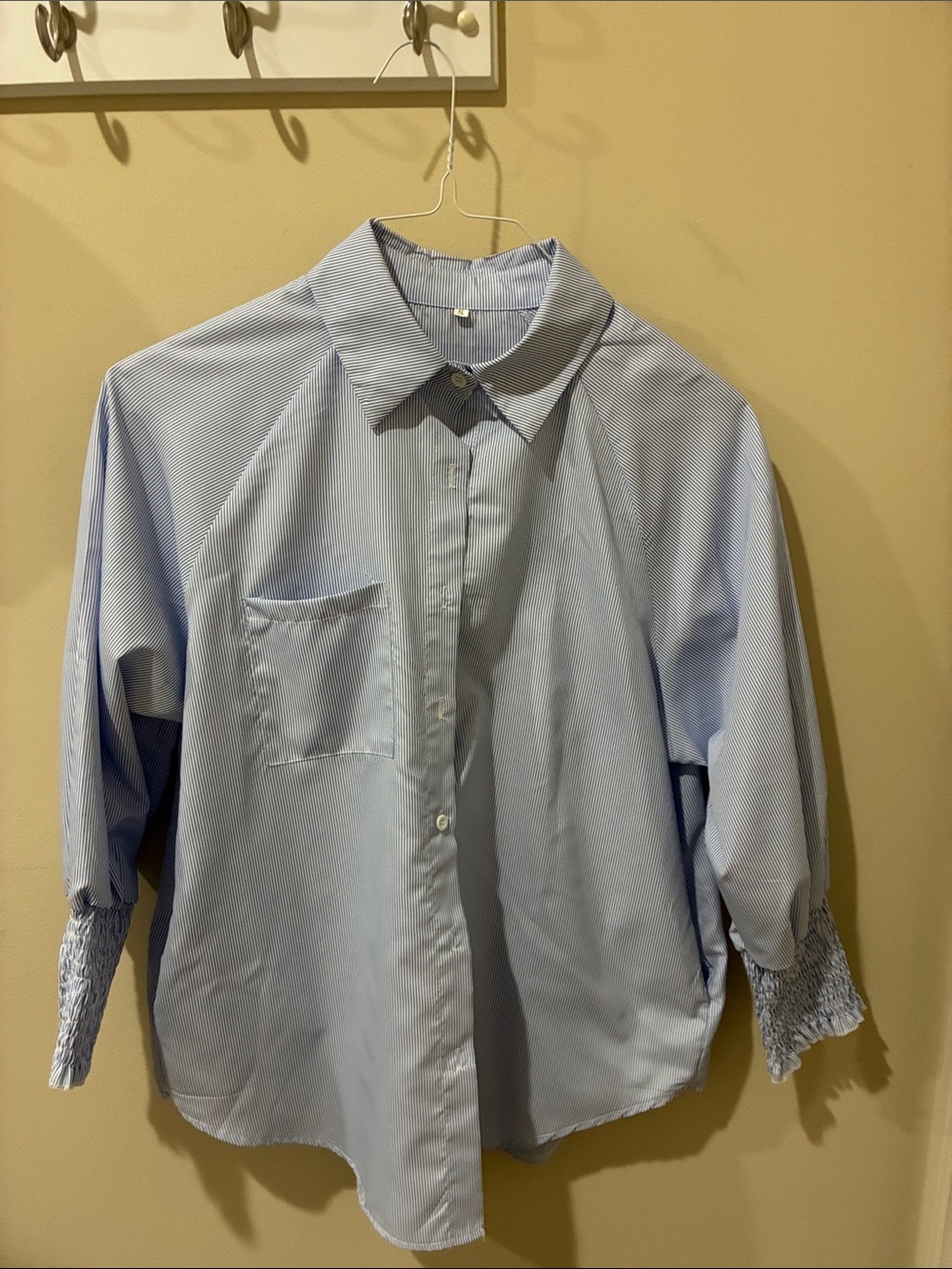 Blouse with smocked cuffs